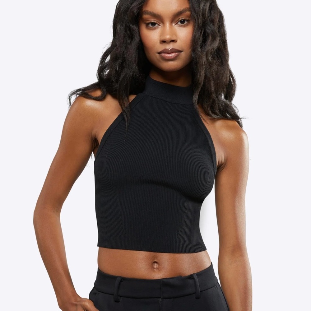 Brand new - sports bra- never worn and new . Needs a new home